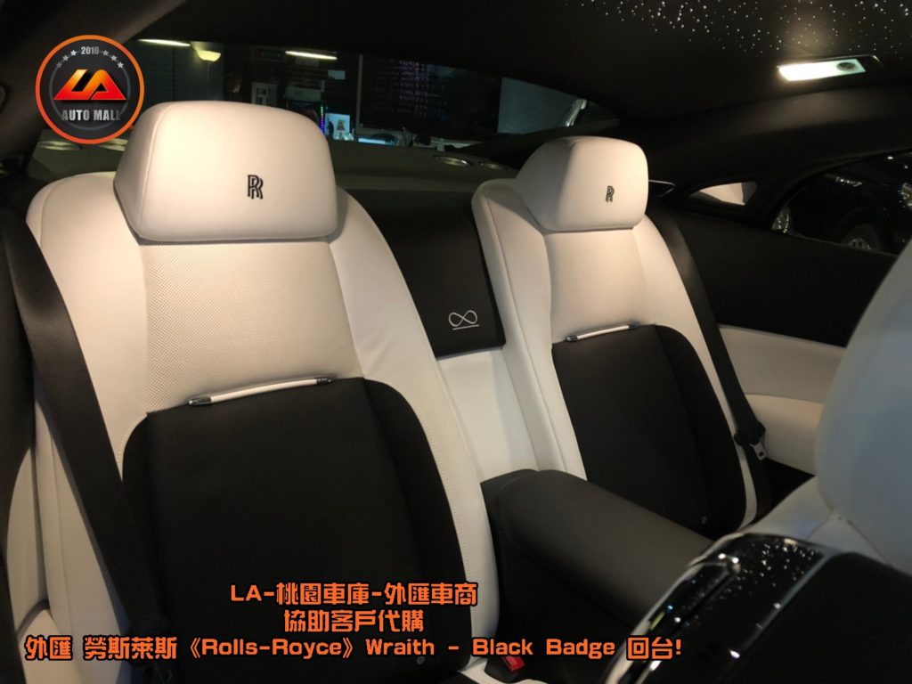 【台灣外匯車商推薦】【Black Badge (黑化版本) 特色】「Unlimited」的無限標誌也會刺繡在 Black Badge 系列車型的 門檻飾板 與 座椅上 ，這 "無限" 字樣，有著讚揚每位購入勞斯萊斯 Wraith Black Badge 的層峰車主， 在人生中遇到限制與挫折時，還能不受任何限制，繼續勇於接受挑戰的態度。。暗黑女神降靈! 外匯 勞斯萊斯 Wraith Black Badge 獨家代購回台。 代購勞斯萊斯 Rolls-Royce Wraith Black Badge外匯價格、配備、馬力、規格、油耗介紹，LA-桃園車庫代購外匯 勞斯萊斯 Wraith Black Badge 回台價格會划算嗎? ，勞斯萊斯Wraith Black Badge外匯車代購流程開箱分享。桃園、台北、新竹、北部地區有推薦的外匯車商嗎? LA桃園車庫是台灣Mobile01、PTT網友推薦的外匯車商之一!為什麼大家都要推薦LA-桃園車庫外匯車商代購外匯車呢?LA-桃園車庫評價又是如何？LA-桃園車庫是黑心車商嗎？
